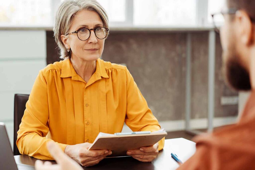 hr director delivers performance improvement plan to employee
