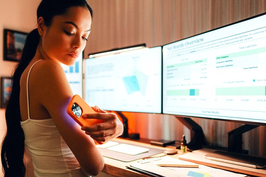 woman at work using wearable technology